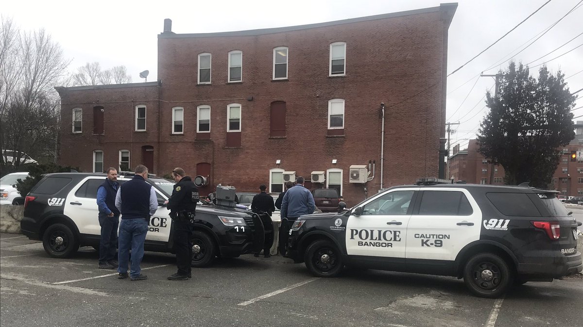 Police has set up crime scene tape around the Bangor Homeless Shelter parking lot directly across the street from the police department. The mobile crime unit is also on scene, investigating inside of one car parked in the lot. 