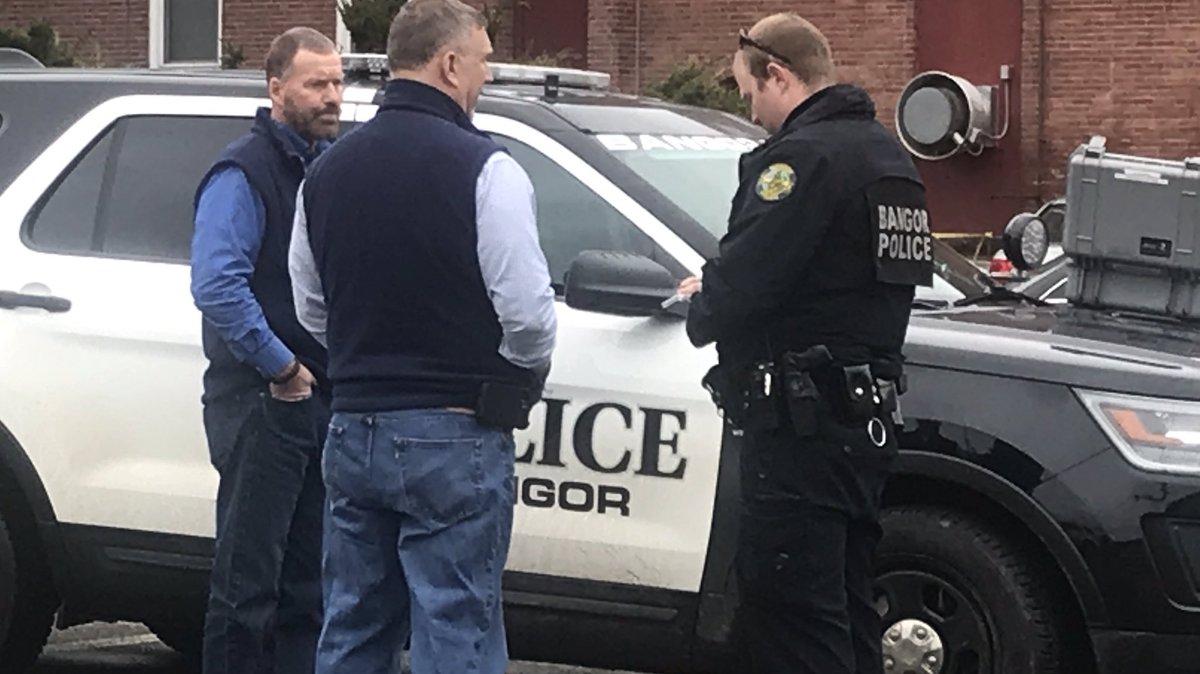 Police has set up crime scene tape around the Bangor Homeless Shelter parking lot directly across the street from the police department. The mobile crime unit is also on scene, investigating inside of one car parked in the lot. 