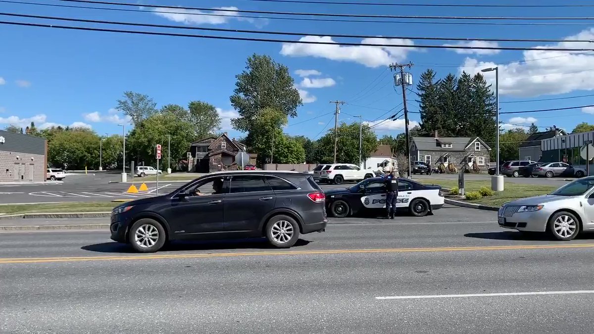 Officers with the Maine State Police, Presque Isle Police and Aroostook County Sheriff's are on the scene of an apparent standoff near the Presque Isle McDonald's. Officers can be seen with guns drawn. 