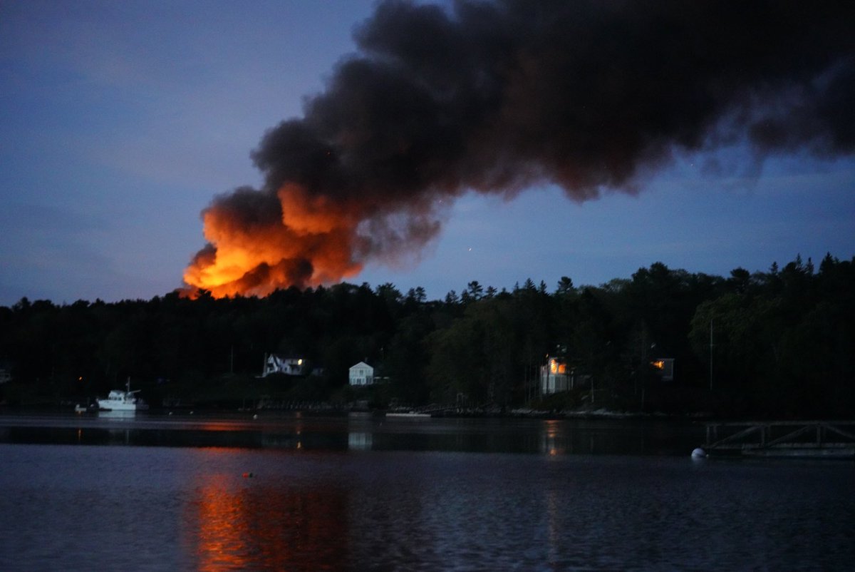 Massive fire in Boothbay Harbor. Emergency officials are urging the public to stay away from the area of Lakeview Road.